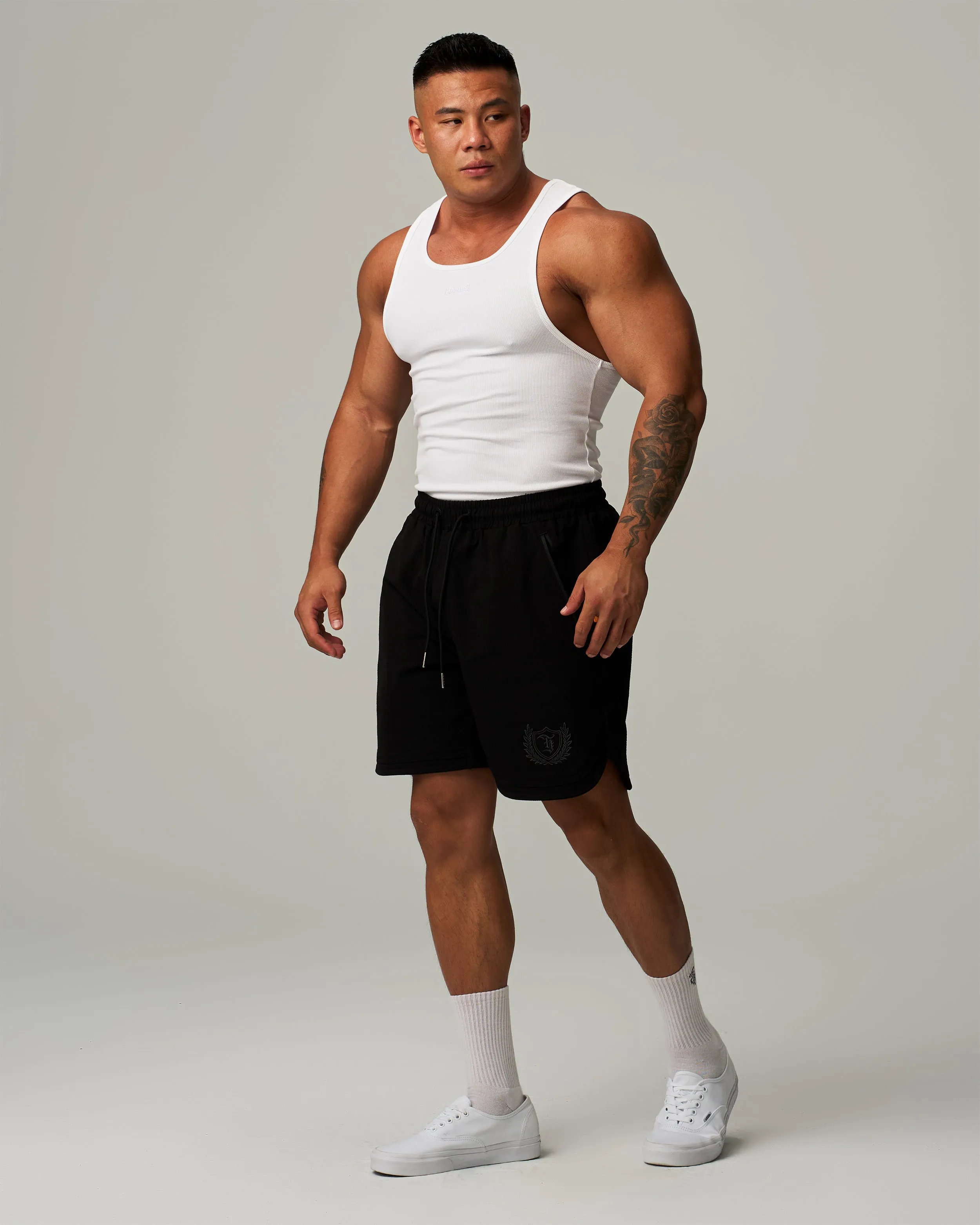 Badge Side Slit Stretch Shorts