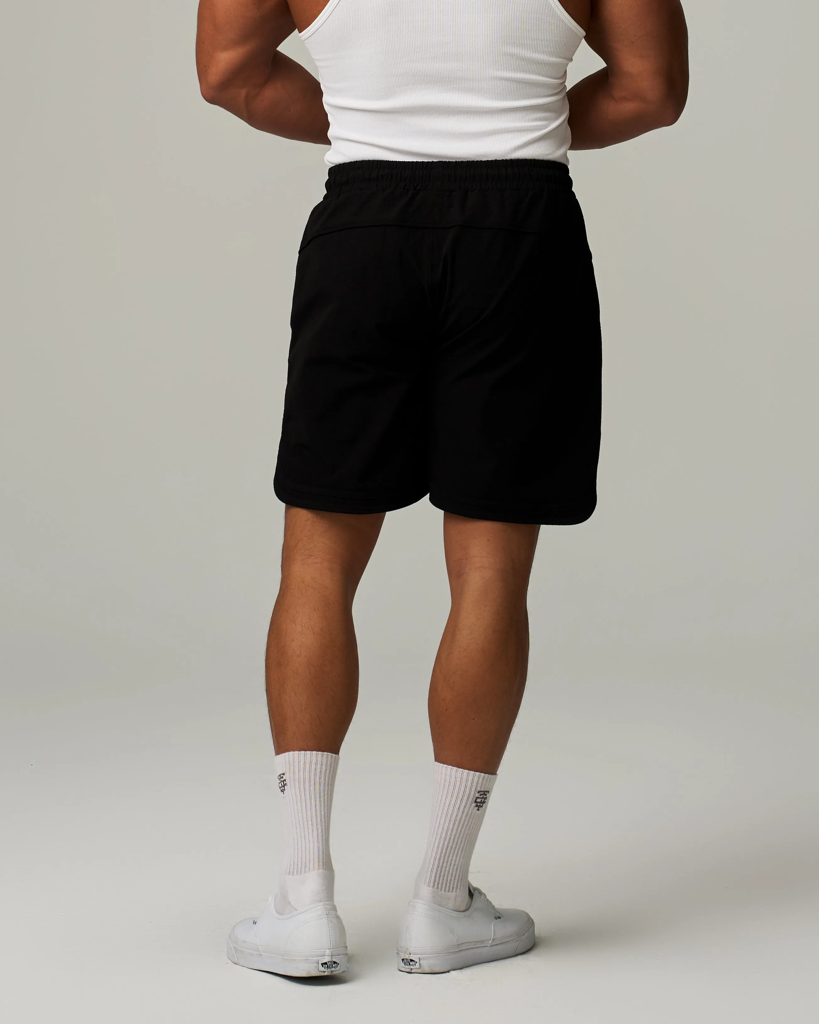 Badge Side Slit Stretch Shorts