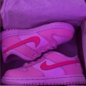 Nike Pink and Red Sneakers